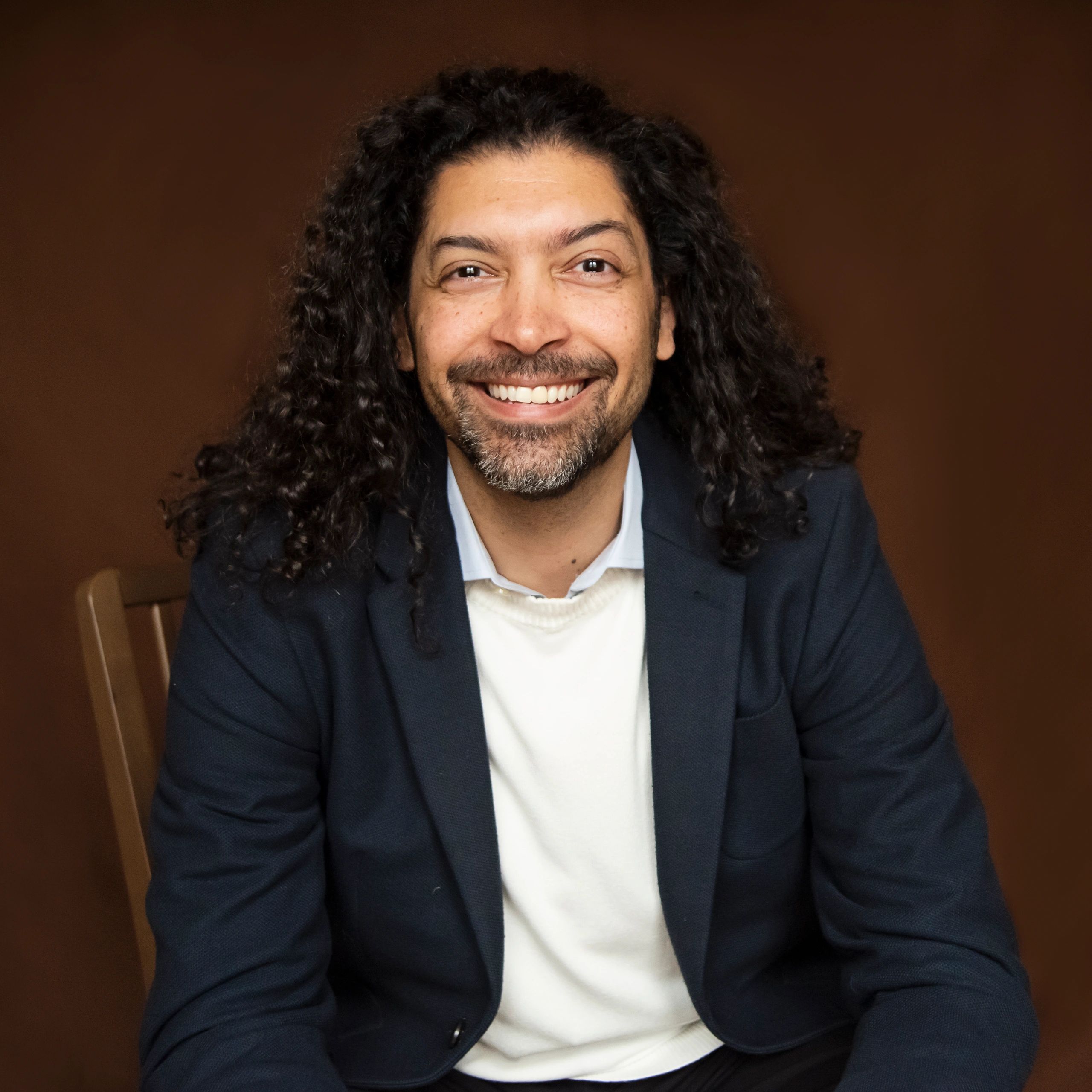 Professional headshot of a business owner