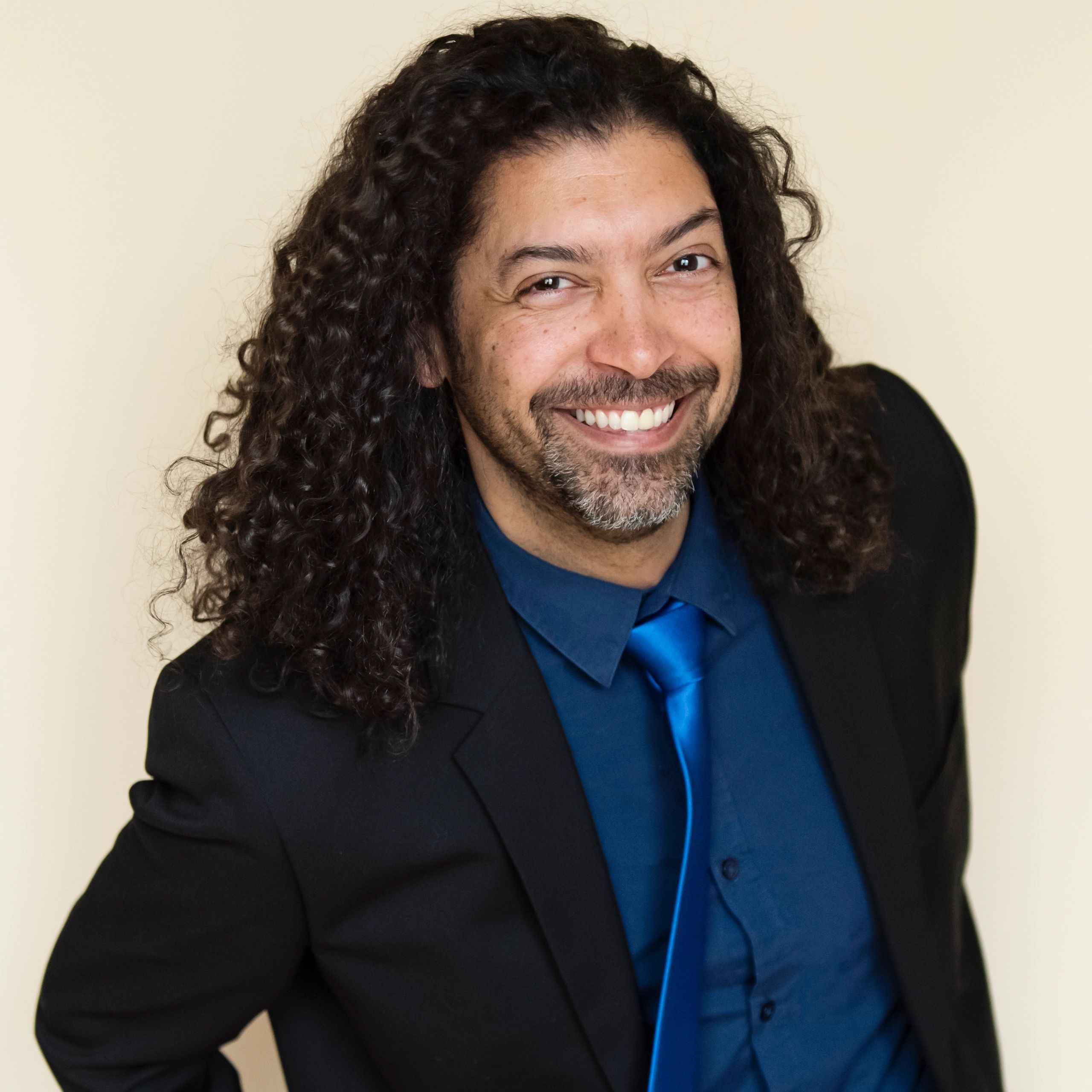 Professional headshot of a business owner